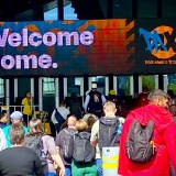 image of front doors to PAX Aus 2025 at Melbourne Convention Centre, with a crowd of attendees walking in