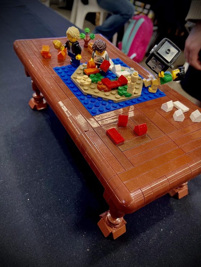 Picture of LEGO MOC of friends gaming on table